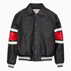 Black jacket with red and white accents on a black background