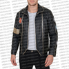 Man wearing a black jacket with white accents on a branded background