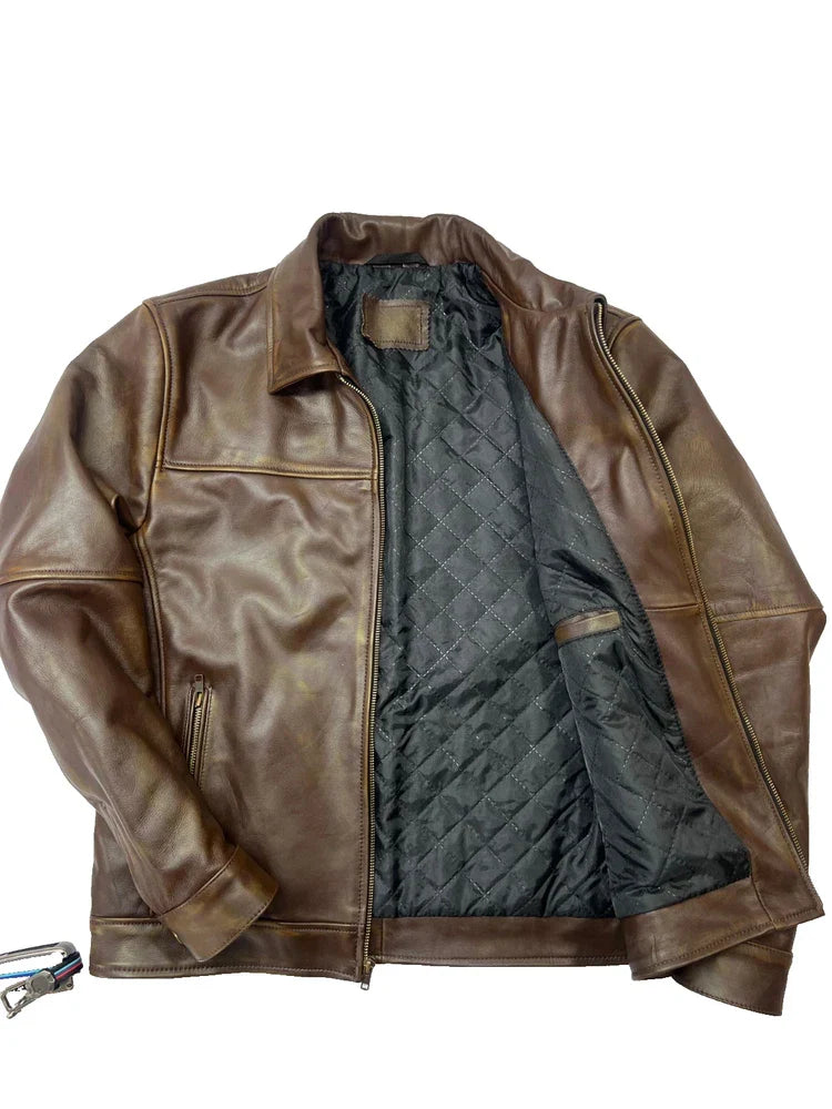 Brown leather jacket with quilted gray lining on a white background