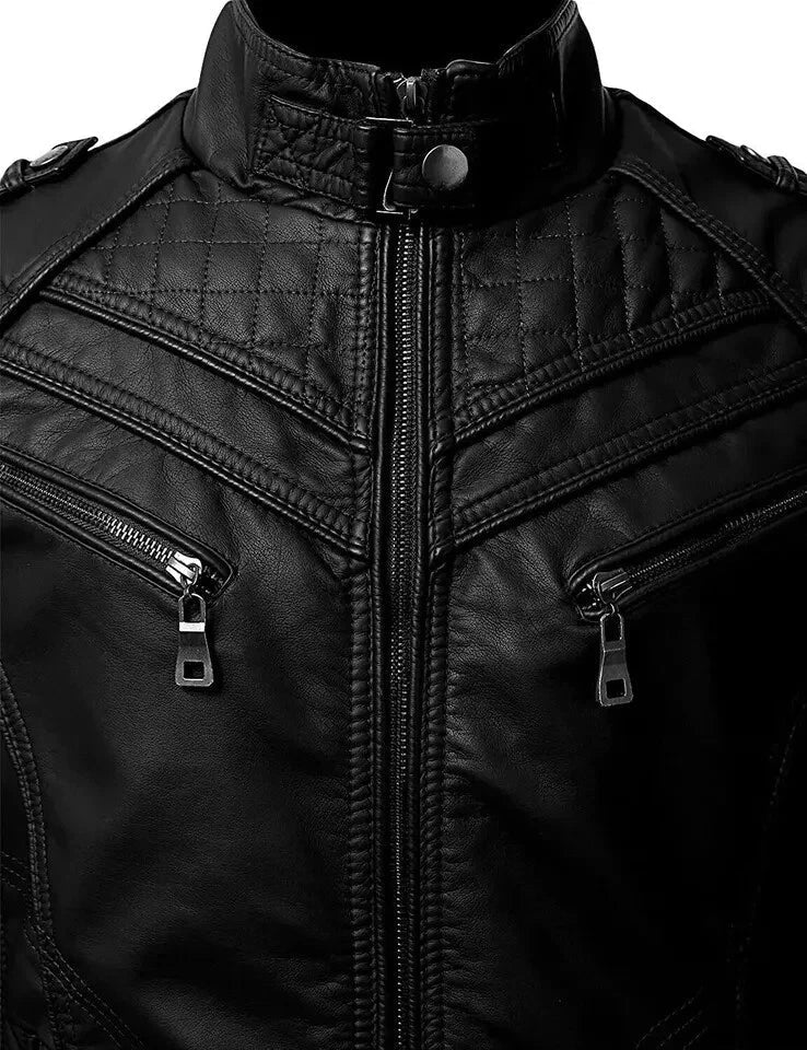 Close-up of a black leather jacket with zippers and buttons.