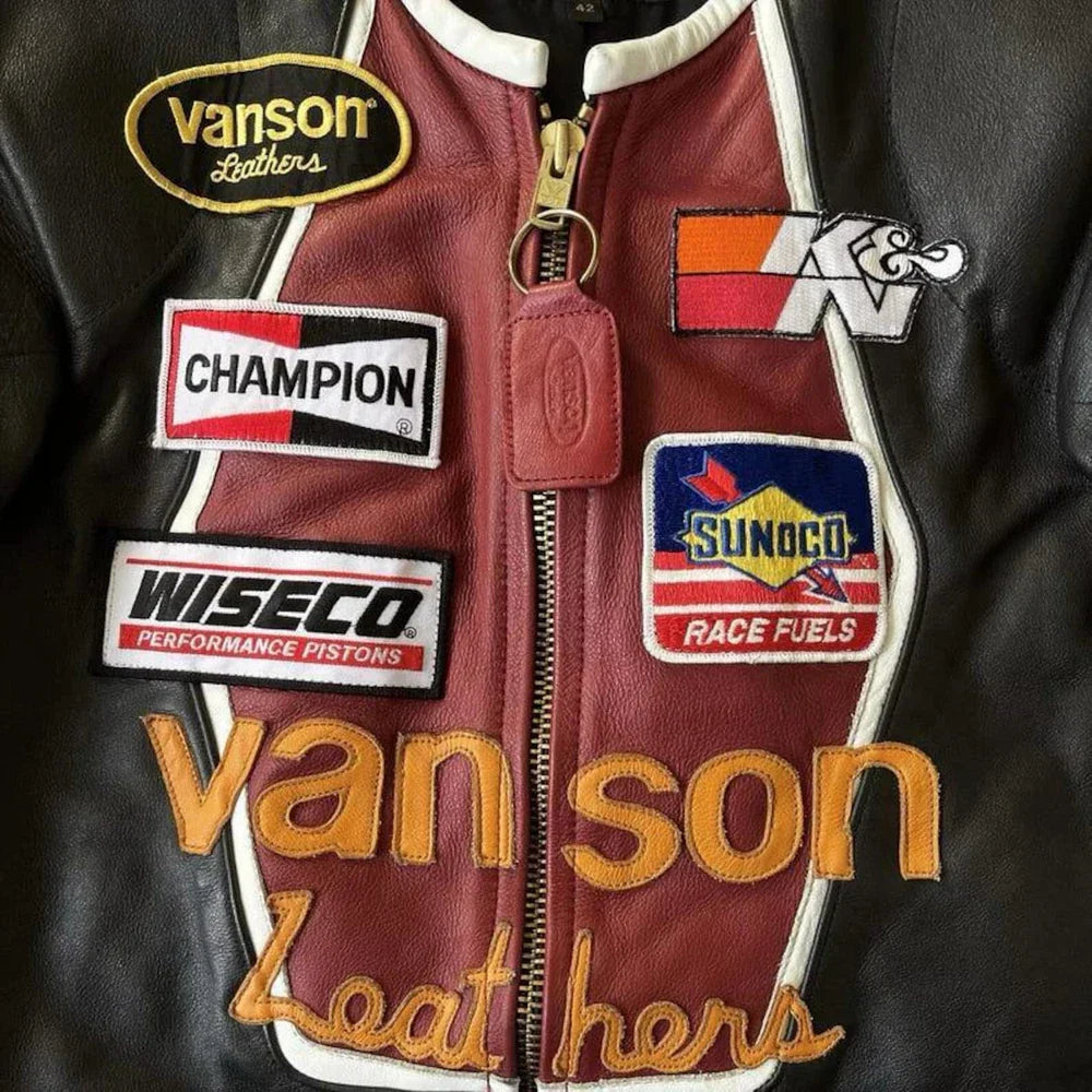 Leather jacket with various brand logos including Vanson, Champion, Wiseco, and Sunoco.