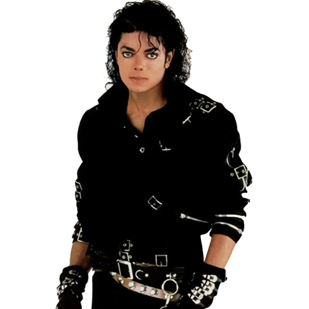 Person wearing a black outfit with silver accents on a white background