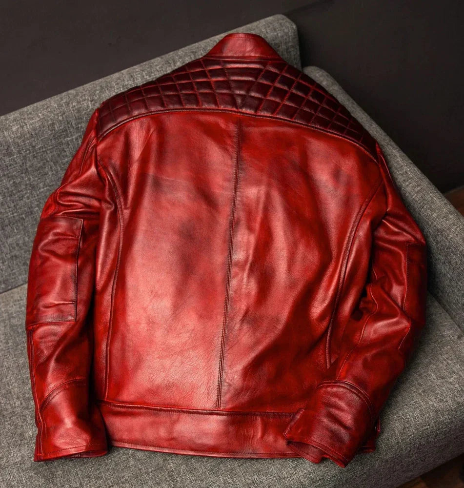Red leather jacket on a textured surface